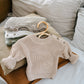 baby knit sweater with buttons on the shoulder