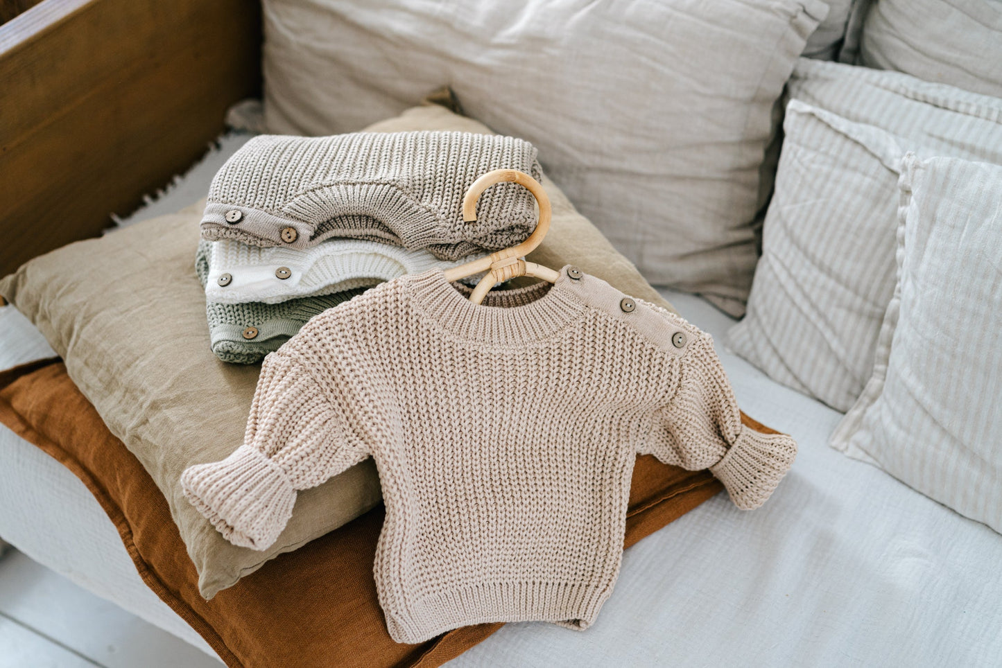 baby knit sweater with buttons on the shoulder